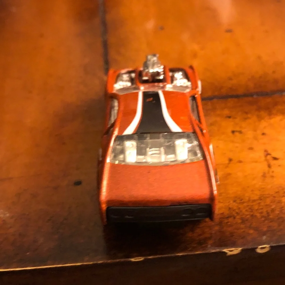 Orange Toy Muscle Car with Exposed Engine